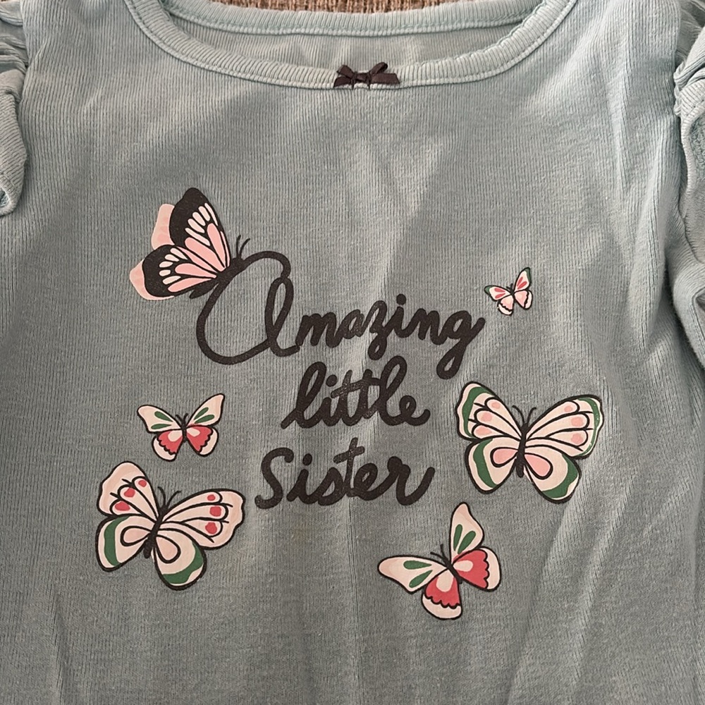 Carter onesie. Little sister.